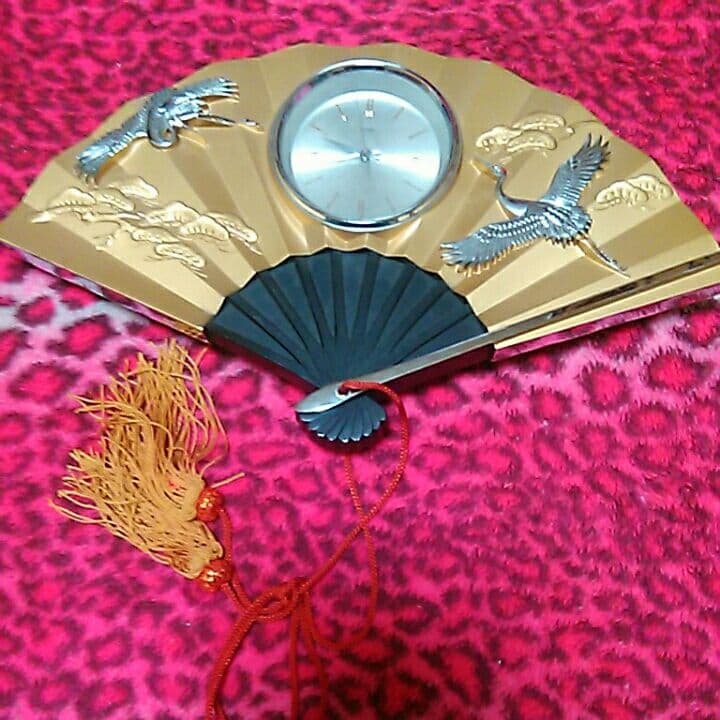 フサ付き金扇子型鶴時計