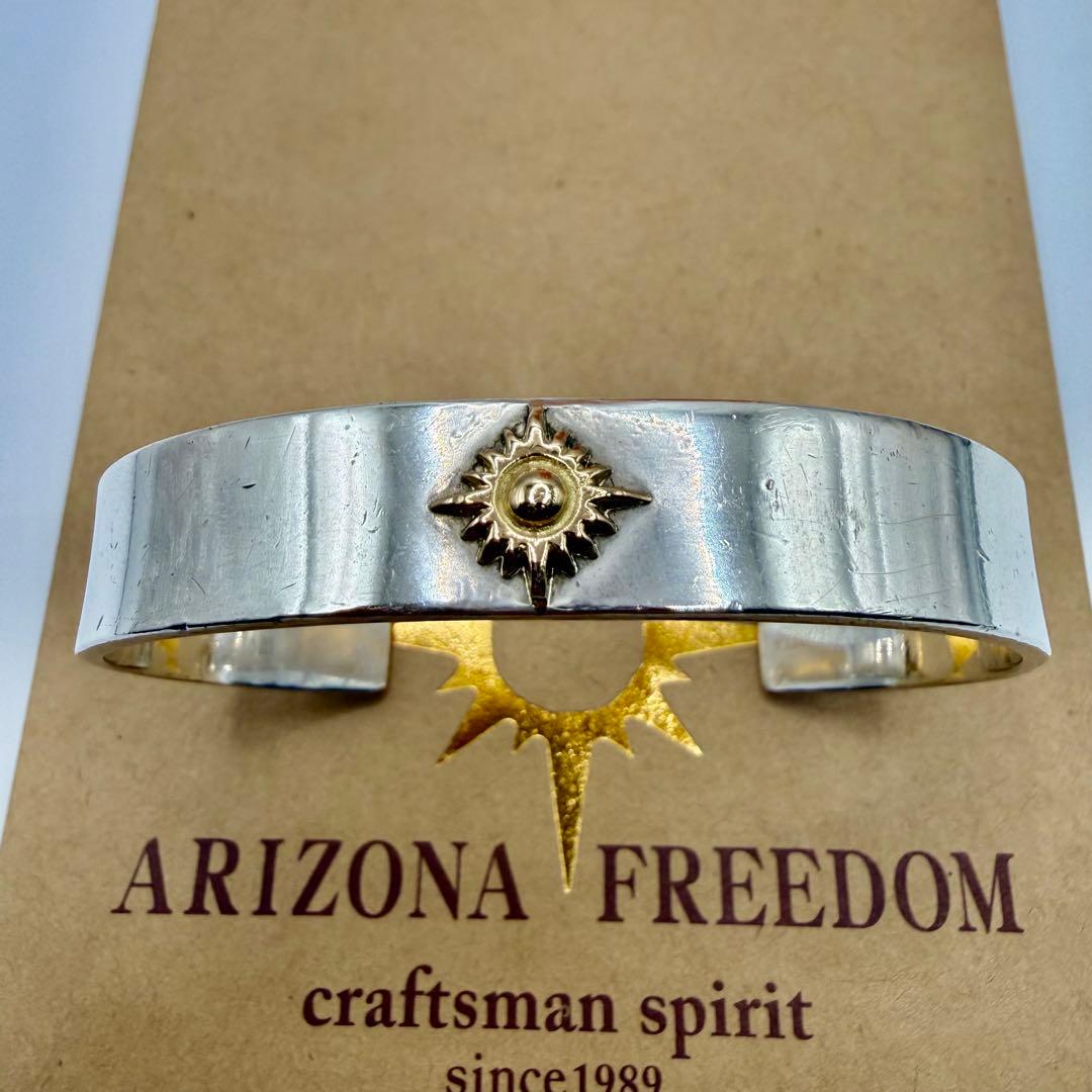 アリゾナフリーダム　k18太陽神付き平打バングル B-19a 定価89650円