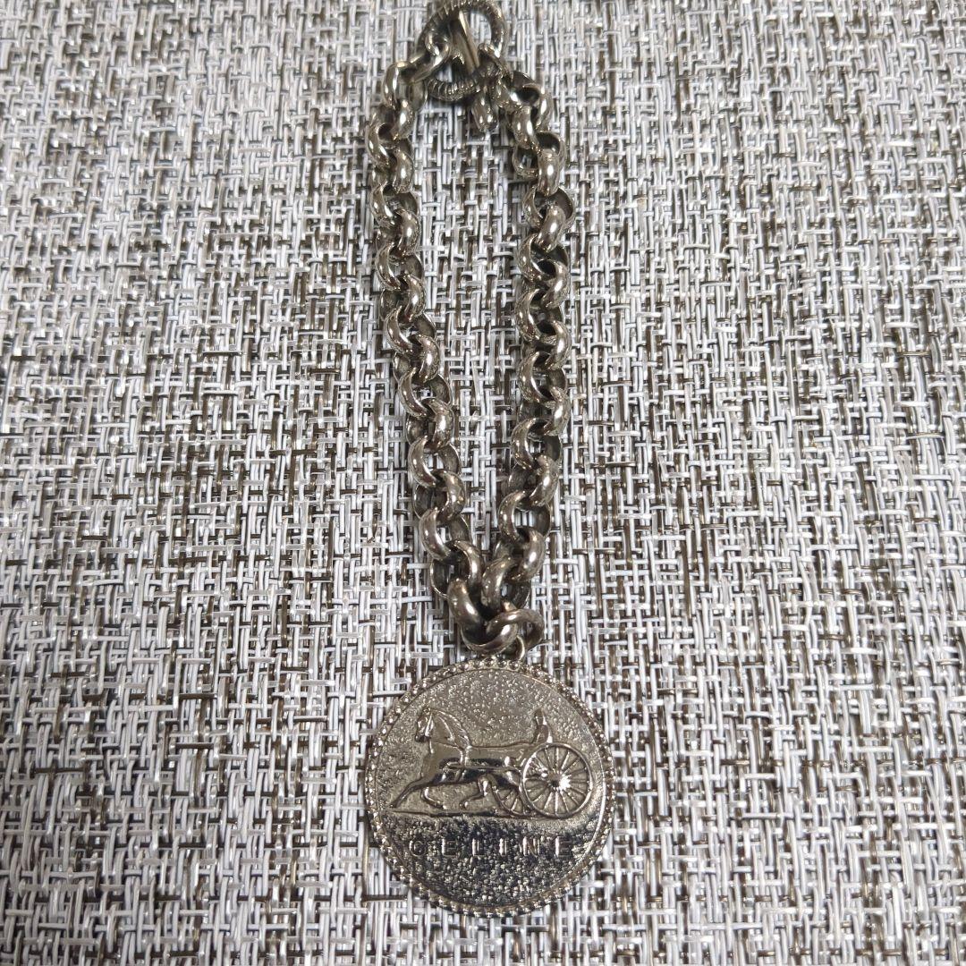 CELINE メダル型ブレスレット　馬車金具